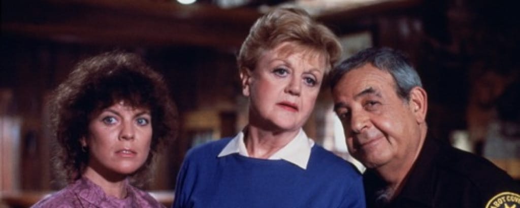 Jessica Fletcher and the sheriff looking perplexed.